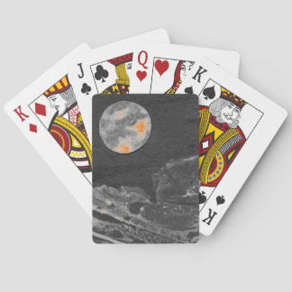 A close up view of fantasy worlds and their moons  poker cards