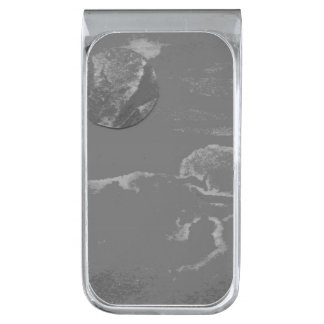 A close up view of fantasy worlds and their moons silver finish money clip