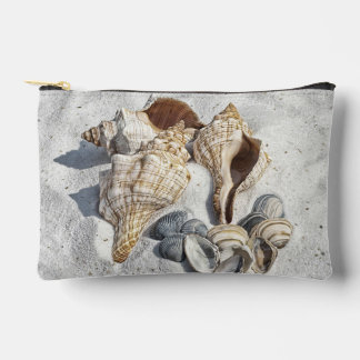A Collection of Seashells on Sand Accessory Pouch