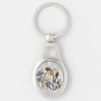 A Collection of Seashells on Sand Keychain