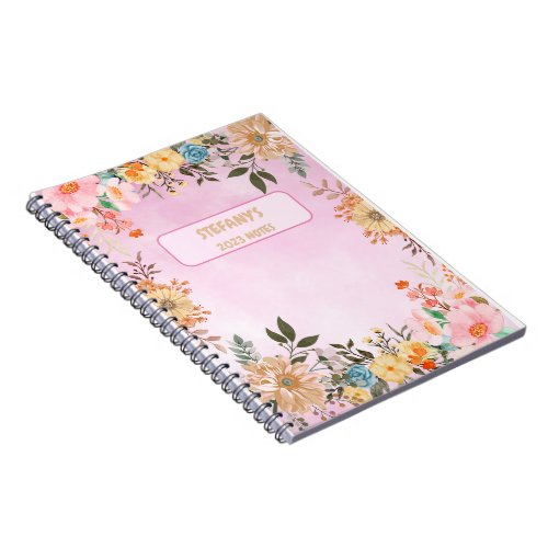 A colorful floral  notebook