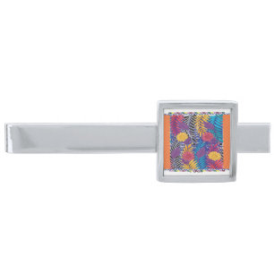 a colorful flower and leaves pattern on a blue bac silver finish tie bar