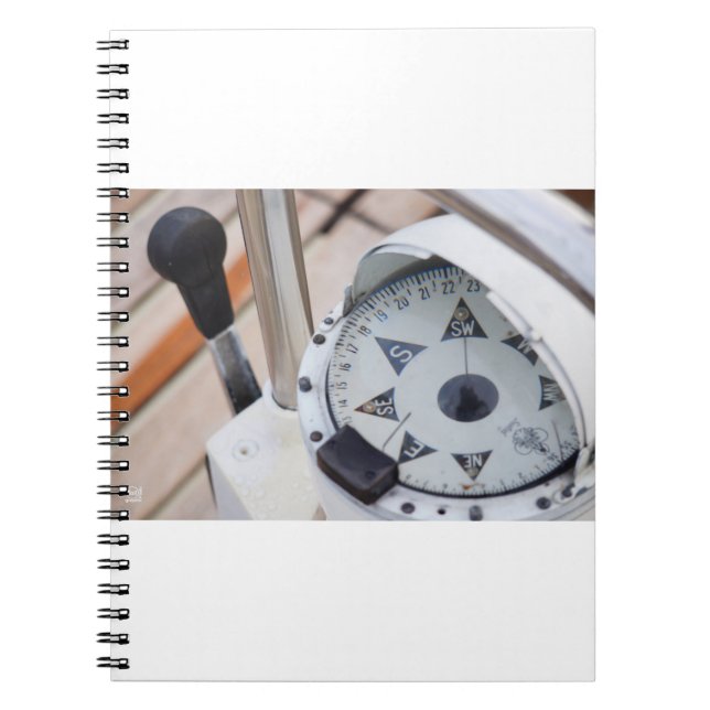 A compass to chart a course for adventure. notebook (Front)
