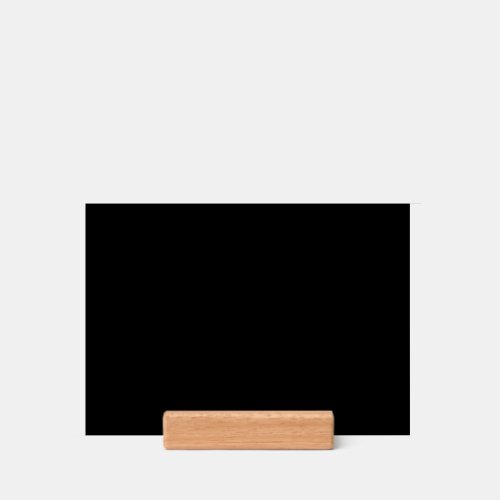 A completely black image with a subtle textured holder