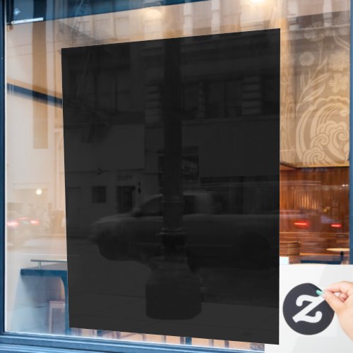 A completely black image with a subtle textured window cling