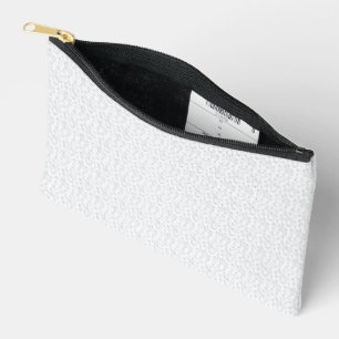 A completely white, featureless surface fills the accessory pouch