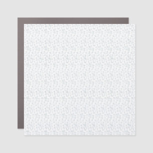 A completely white, featureless surface fills the car magnet