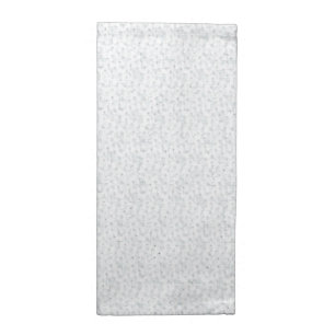 A completely white, featureless surface fills the cloth napkin
