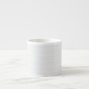 A completely white, featureless surface fills the  espresso cup