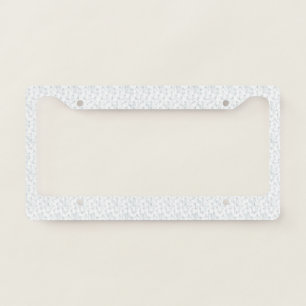 A completely white, featureless surface fills the  license plate frame