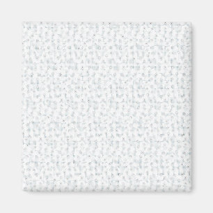 A completely white, featureless surface fills the  magnet