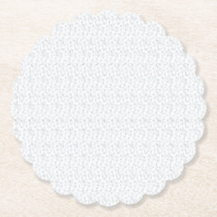 A completely white, featureless surface fills the paper coaster