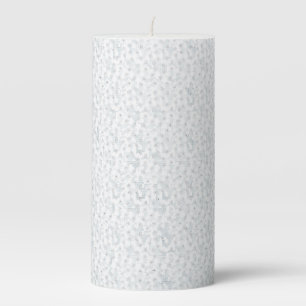 A completely white, featureless surface fills the pillar candle