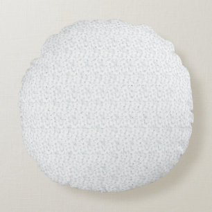 A completely white, featureless surface fills the  round pillow