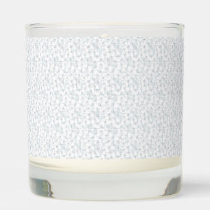 A completely white, featureless surface fills the  scented candle