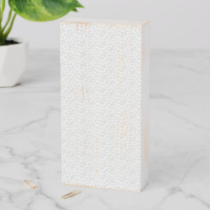 A completely white, featureless surface fills the  wooden box sign