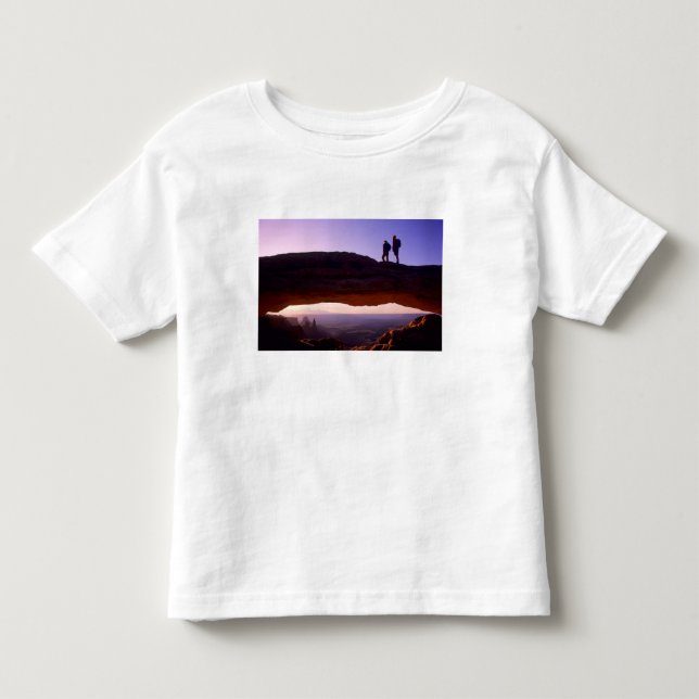 A couple watches sunrise from atop Mesa Arch in Toddler T-shirt (Front)