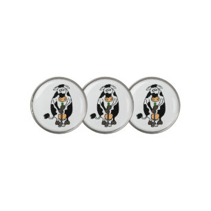 A cow playing golf ball marker