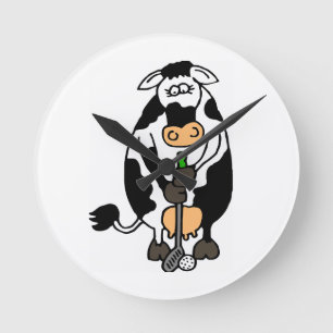 A cow playing golf round clock