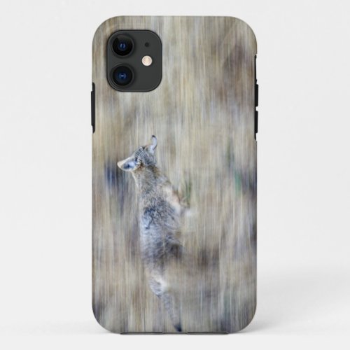 A coyote runs through the hillside blending into iPhone 11 case