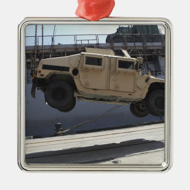 A crane lifts an M998 Humvee Metal Ornament (Front)