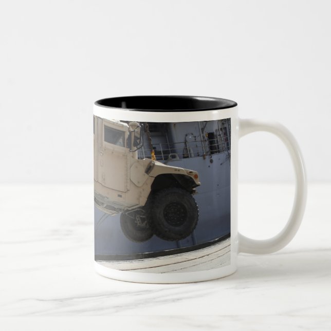 A crane lifts an M998 Humvee Two-Tone Coffee Mug (Right)