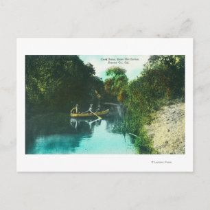 A Creek Scene with Family in a Canoe Postcard