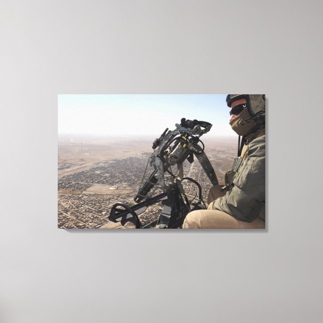 A crew chief looks for suspicious activity canvas print (Front)