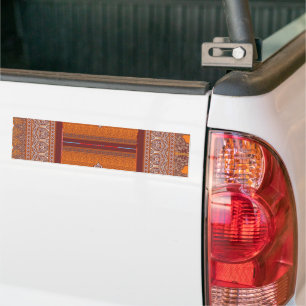 a cross stitch pattern in orange and brown bumper sticker