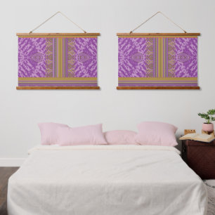 a cross stitch pattern with a purple and yellow b hanging tapestry