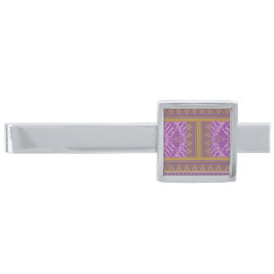 a cross stitch pattern with a purple and yellow b silver finish tie bar