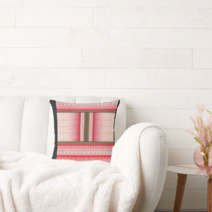 a cross stitch pattern with a red background throw pillow