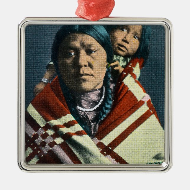 A Crow Indian Madonna and Child Metal Ornament (Front)