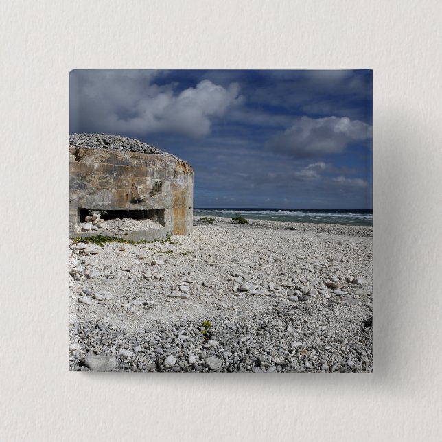 A crumbling bunker pinback button (Front)