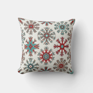 A cushion with a snowflake pattern