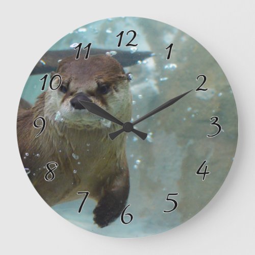 A cute Brown otter swimming in a clear blue pool Large Clock