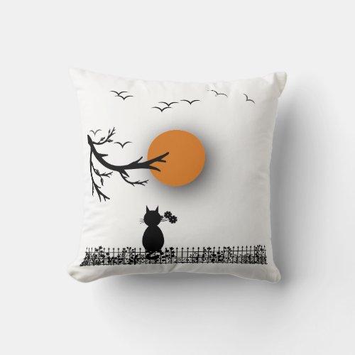A cute cat sits and watches the sun  throw pillow