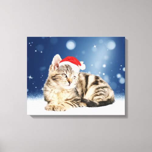 A Cute Cat wearing red Santa hat Christmas Snow Canvas Print