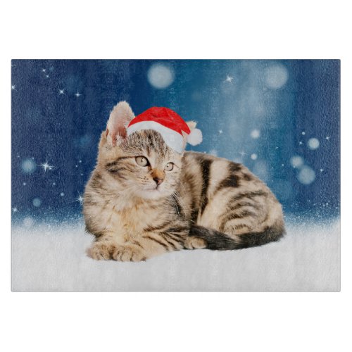 A Cute Cat wearing red Santa hat Christmas Snow Cutting Board