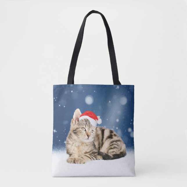 A Cute Cat wearing red Santa hat Christmas Snow Tote Bag (Front)