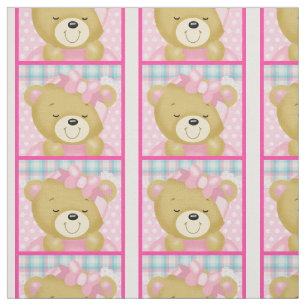 A Cute Cuddly Bear Dressed in Pink Fabric