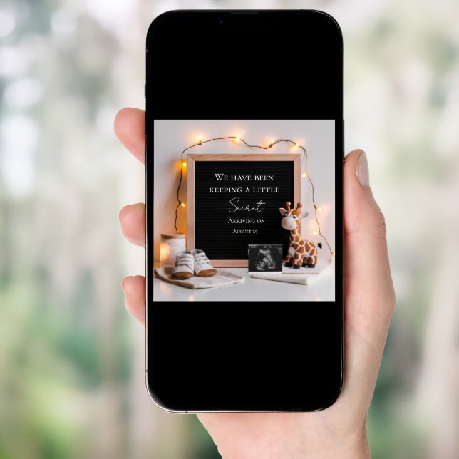 A cute joyful baby giraffe pregnancy announcement  (Front Digital)