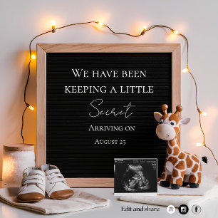 A cute joyful baby giraffe pregnancy announcement