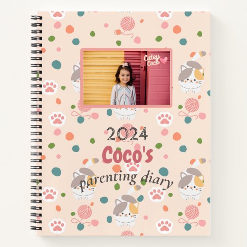 a cute_patterned parenting diary notebook