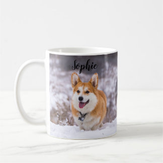 A Cute Pembroke Welsh Corgi Frolicking in the Snow Coffee Mug