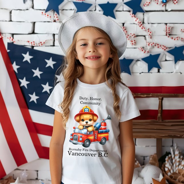 A cute puppy firefighter drives a miniature truck T-Shirt (Creator Uploaded)