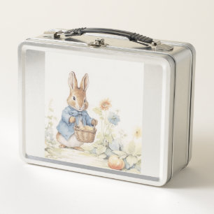 A cute rabbit in a jacket in a clearing with a bas metal lunch box