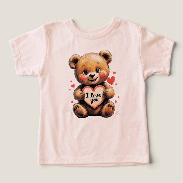 A cute teddy bear holding a heart-shaped card  toddler t-shirt (Design Front)