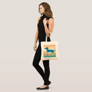 A cute tote bag with a wiener dog illustration