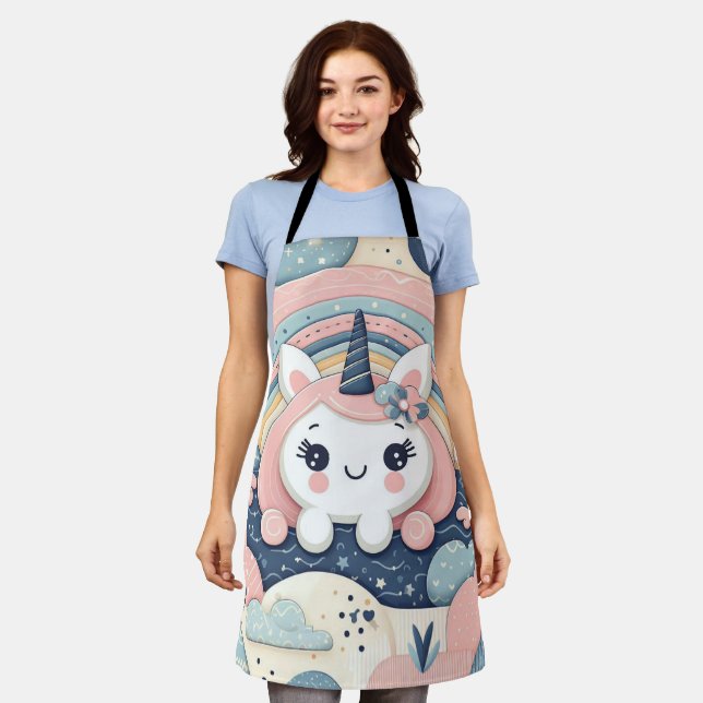 A cute unicorn peeks out from behind a rainbow apron (Worn)